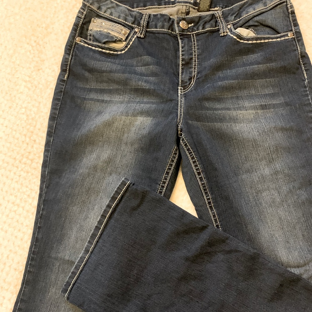 Love Indigo dark prewashed bootcut jeans,size 14,length 32. Design on back